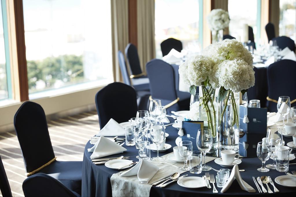 Grand Josun Ciudad Metropolitana de Busan Exterior foto A table set for a formal dinner